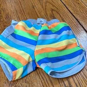Iplay infant boy swim trunks.  Yellow, blue, green stripes.
